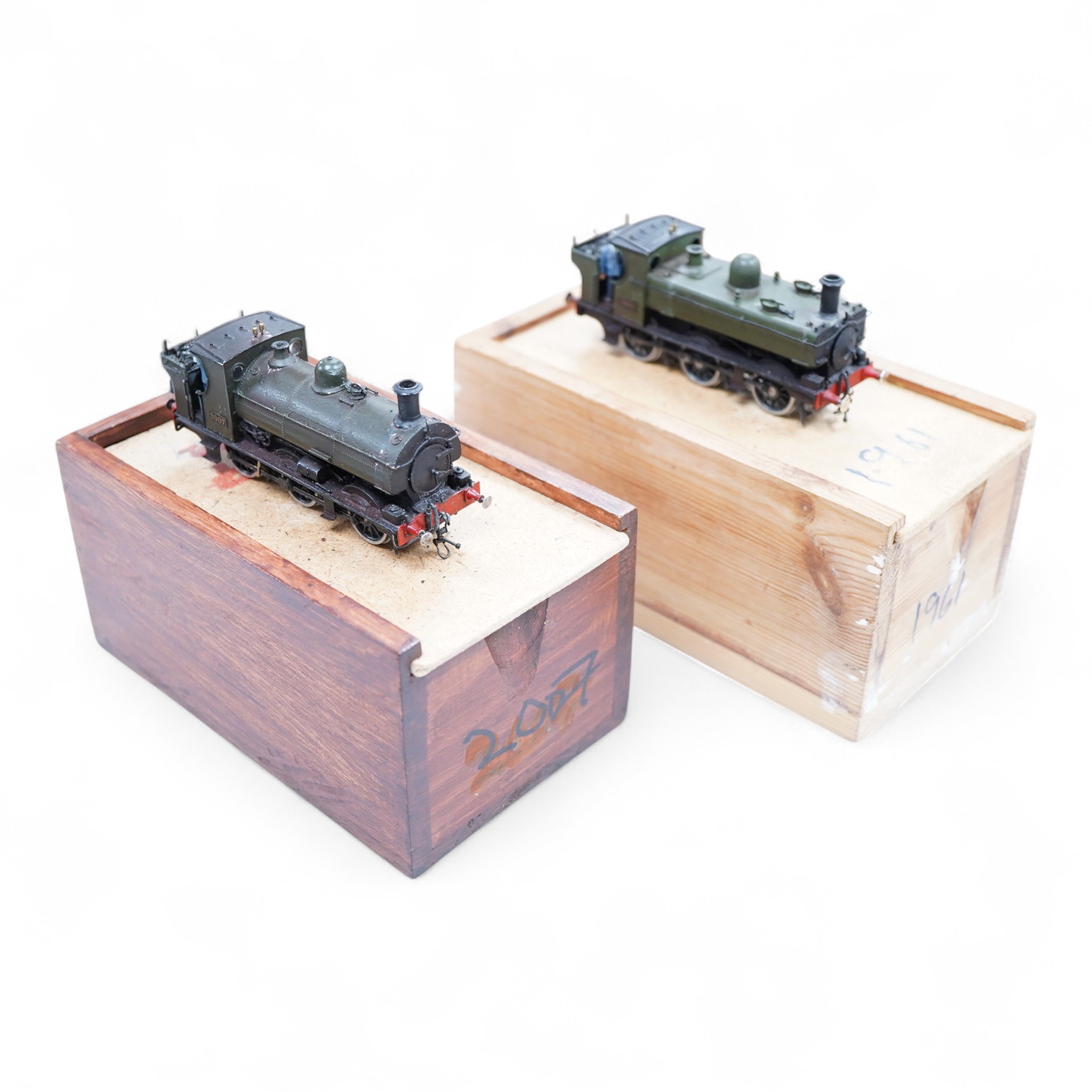 Two EM gauge scratch built model railway GWR locomotives by John Worsley, an 0-6-0PT, 1961, and an 0-6-0ST, 2007, both detailed models with opening smoke box doors showing the details of the blast pipe and boiler tube en